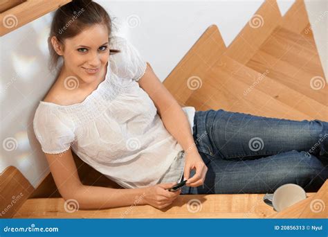 attractive girl smiling at stairway stock image image of clothing caucasian 20856313