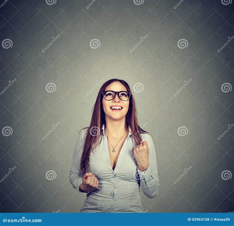Happy Business Woman Pumping Fists Celebrating Success Stock Photo