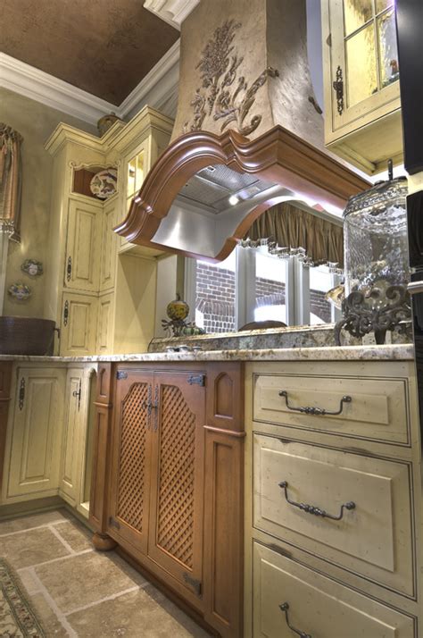 Tapping into styles from the 17th and 18th centuries, a colonial kitchen is an example of early american classic kitchen design. French Country Kitchen - Colonial Craft Kitchens