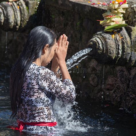 Balinese Families Come To The Sacred Springs Water Temple Of Tirta Empul In Bali Indonesia To