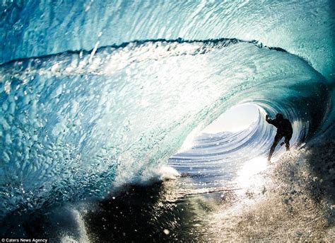 Incredible Shots Show Pro Surfers Riding Waves From Inside The Barrel
