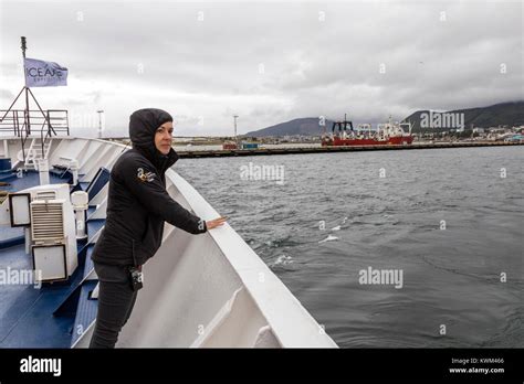 Crew Member On Deck Of Passenger Ship Ocean Adventurer Departs Ushuaia