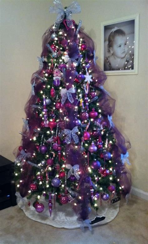 Christmas trees decorated in one color also look stylish. Our Christmas tree this year. Pink, Purple and Silver ...