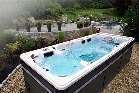 How To Jazz Up Your Outdoors With A Hot Tub The Hot Tub Store Hot Tub And Swim Spa