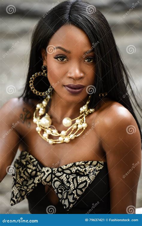 Exotic Looking African American Woman Posing In Front Of Camera Stock Image