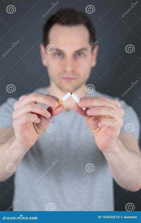 Man Breaking Cigarette Stick Stock Photo Image Of Young Narcotic
