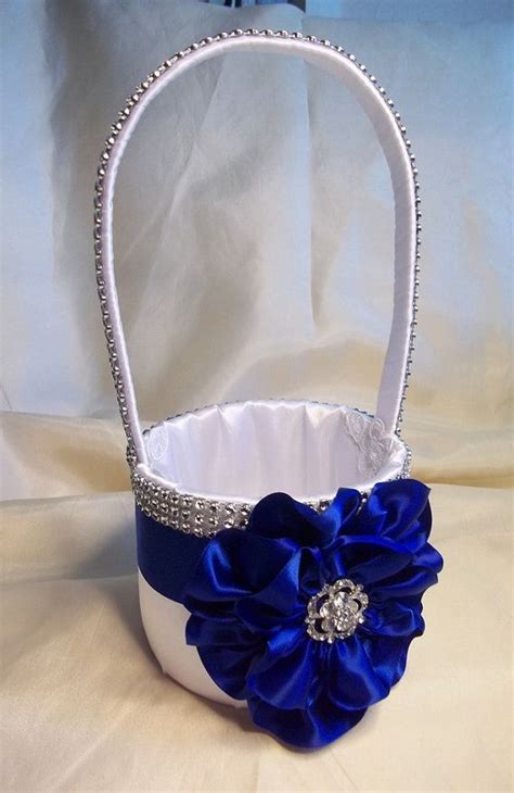 Whether it was the rose gold hair trend, the invention of bronde, or using the entire rainbow as inspiration, celebrities (and their stylists) were at the forefront of many major trends we've. Flower Girl Basket with Royal Blue Flower and by ...
