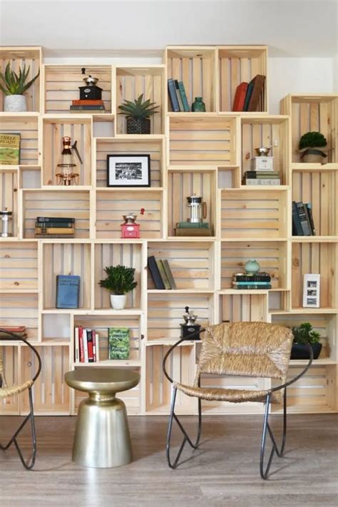 Two Chairs Sitting In Front Of A Wooden Shelf Filled With Books