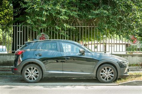 Black Mazda Cx 3 Neo 4x4 Suv Off Road Car Parked On The Street In The