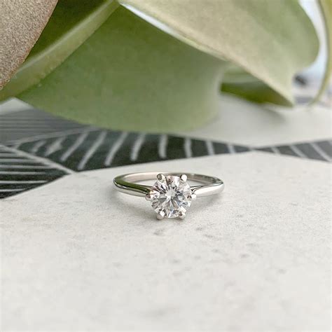 Calliope 1.0 Carat Round Moissanite Hexagon Full Bezel Milgrain 14k