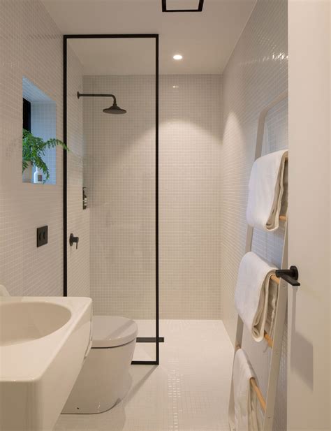 Add graphic pattern tiles to wake up the bathroom's look. How minimalist design took this small bathroom to the next ...