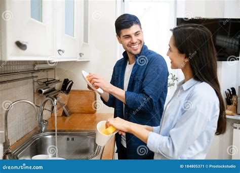 Portrait Of Young Lovely Couple Washing Dishes Stock Image Image Of