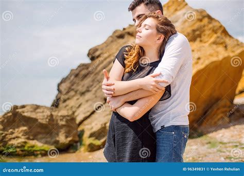 Happy Couple Hugging At The Sea Beach Adult Summer Holidays Stock