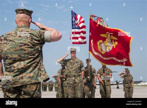 Us Marines Salute While The National Anthem Plays During The Marine