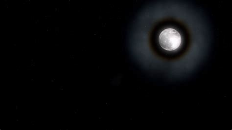 A Big Bright Halo Around The Moon As Viewed On A Clear Starry Night
