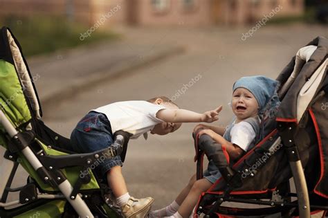 Little Boy And Crying Girl Stock Photo By ©ababaka 23351482
