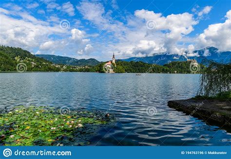 Beautiful Scenery Of Mountain Lake Bled With An Island And A Church In