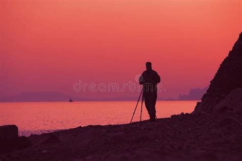 Silhouette Of A Male Photographer By The Sea Stock Image Image Of