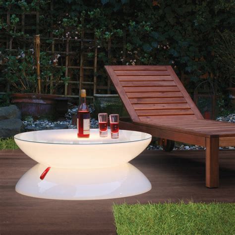 You might even want to style it like you would a work of art. relax outdoor light up table by lime lace ...