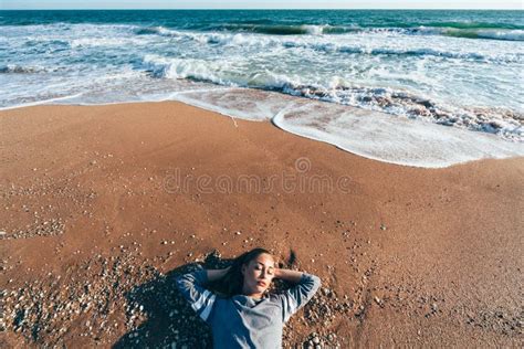 Relaxing On Sand By The Sea Wave Fall Beach Concept Stock Photo
