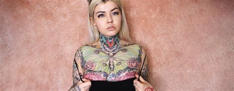 15 Irresistible Sexy Breast Tattoos For Women Wormhole Tattoo