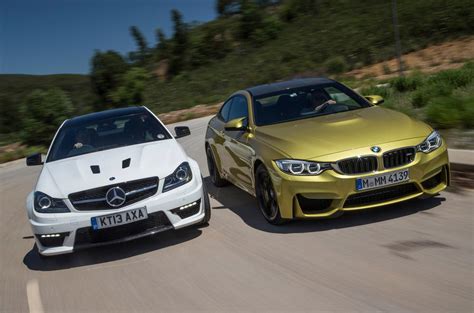 #amg follow @mercedesamgmotorsport for more racing action. Comparison: new BMW M4 vs Mercedes-Benz C63 AMG | Autocar