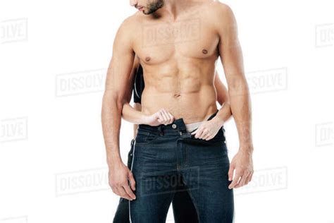 Cropped View Of Woman Unzipping Pants On Man From Behind Isolated On