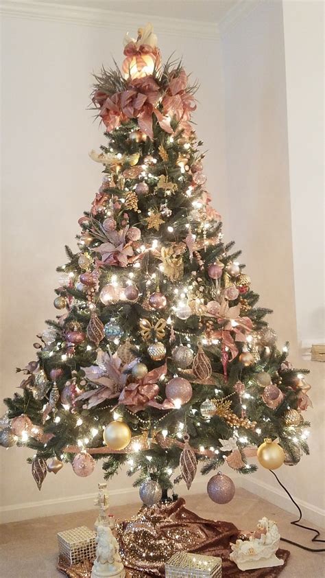Blush pink, rose gold and white flocked vintage inspired christmas tree by kara's party ideas | kara allen for michaels. A Christmas tree decorated in pink and gold | Gold christmas decorations, Rose gold christmas ...