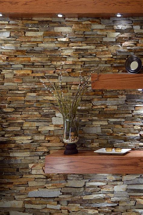 Learn more about using a thin stone veneer to add a stunning accent wall or create an elegant and timeless exterior for your home or backyard living space. Ledgestone fireplace surround interior stone veneer mantel ...