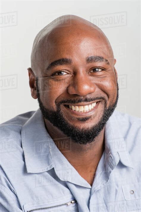 Close Up Of Black Man Smiling Stock Photo Dissolve