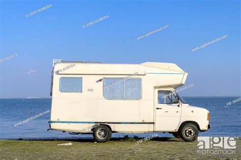 Vintage Camper Van Parked By The Riverfront Stock Photo Picture And