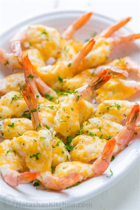 Here's the full instructions for making your own easy shrimp cocktail appetizers. Cheesy Garlic Shrimp Appetizer - NatashasKitchen.com