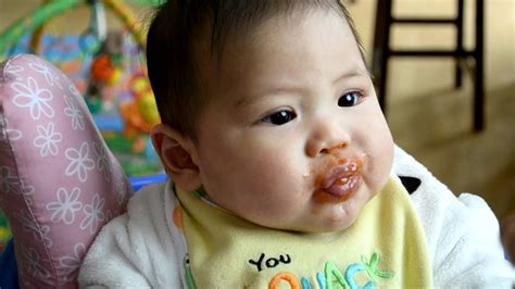 Maybe you would like to learn more about one of these? First baby food for 5 month old Calvin - YouTube