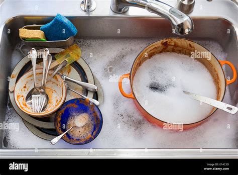 Sink Full Of Dirty Dishes High Resolution Stock Photography And Images