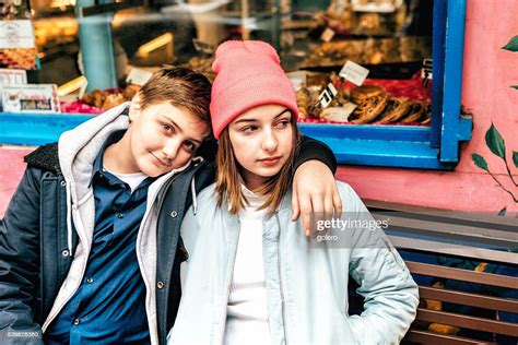 French Teenage Siblings On Bench In Paris High Res Stock Photo Getty
