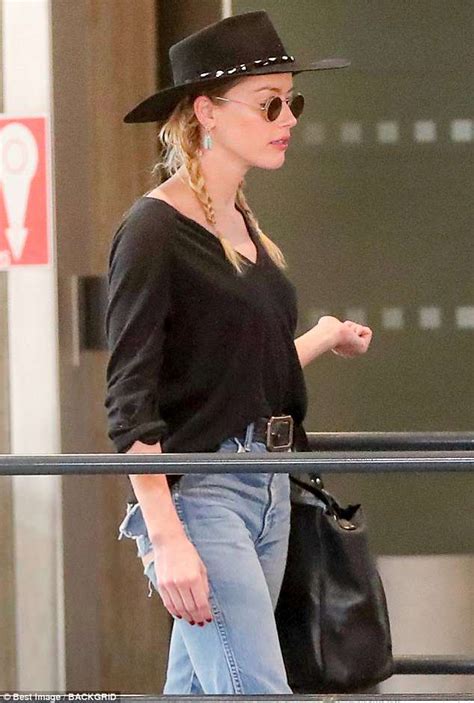 Amber Heard Touches Down In Paris Amid Backlash For Racist Tweet