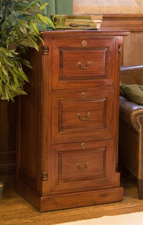 A vertical file cabinet helps you maximize a corner space. La Roque Three Drawer Filing Cabinet - Mango Wood Furniture