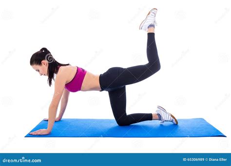 Beautiful Slim Woman Doing Stretching Exercises On Yoga Mat Isolated On White Stock Image