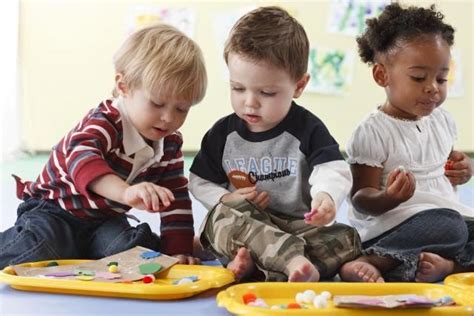 Children Playing At Preschool