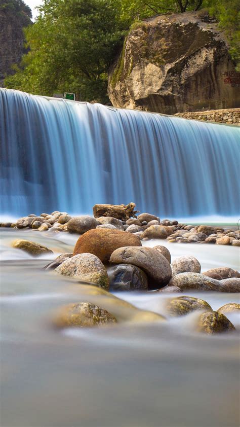 Download Wallpaper 1080x1920 Waterfall Stones Fog Nature Samsung