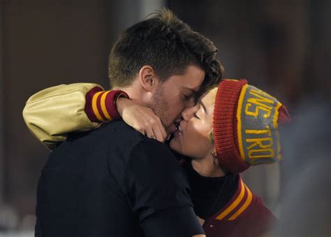 Miley Cyrus Patrick Schwarzenegger Go Public With New Romance At College Football Game