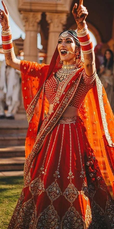 Indian Wedding Dresses 18 Unusual Looks And Faqs Red Wedding Gowns Indian Wedding Dress