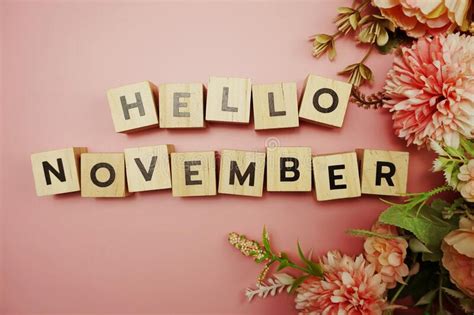 Hello November Alphabet Letters With Flower Bouquet On Blue Background