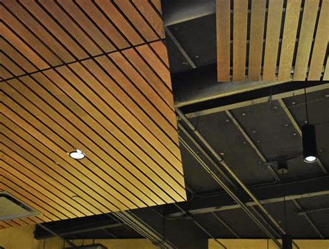 Plan the placement of the wooden main runners so they are 25. Suspended wood ceilings (Wood Drop Ceiling) - 9Wood