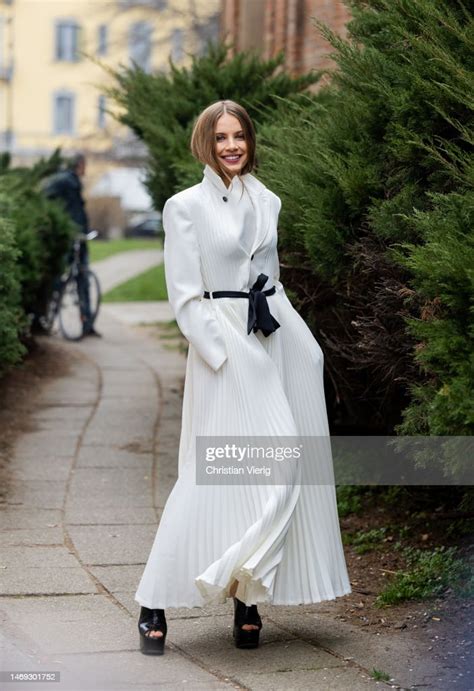 Xenia Tchoumitcheva Wears White Pleated Dress Outside Philosophy