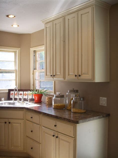 I would like to install crown molding at the tops of my cabinets so that it will go up to the ceiling, but i am unsure of the best way this is to be done. love the cabinets going to ceiling with crown molding ...