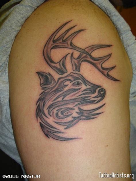 Tribal Deer Tattoo On Upper Arm 3 Tattoos Book 65000 Tattoos Designs