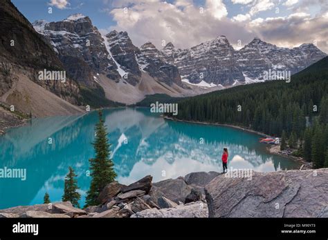 Woman Looking Over Moraine Lake From The Rockpile Canadian Rockies