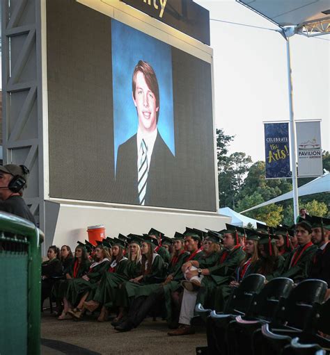 The Woodlands High School Graduates Rise For Grant Milton