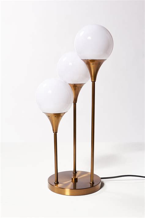 First, the wealth table lamp from neiman marcus is hand crafted of solid brass with a linen shade. LT193 Colonnade Brass Globe Table Lamp Prop Rental | ACME ...